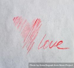 Valentine Day holiday card concept with red heart and love scribbled on paper 5nggWA
