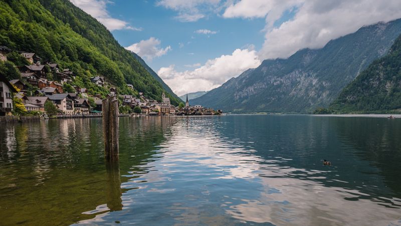 The beautiful Austrian village of Hallstatt on the shores of an alpine lake.