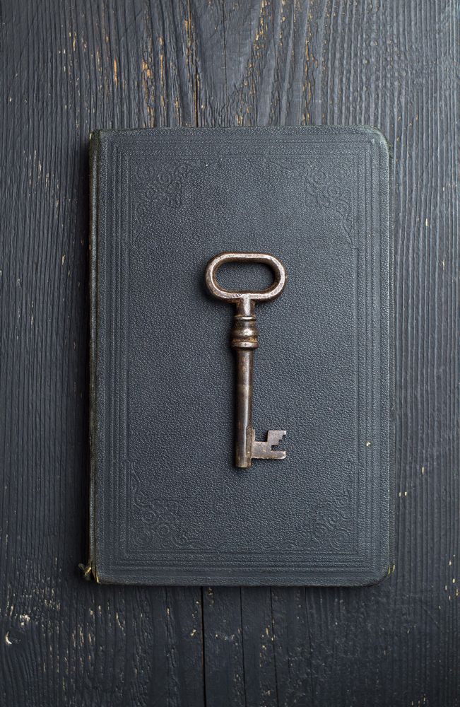 Vintage Key over dark leather book cover