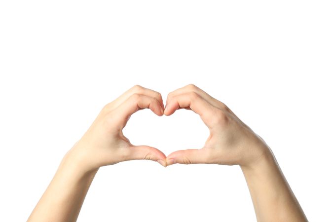 Female hands show heart, isolated on blank background