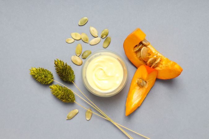 Concept of different cosmetic products, Pumpkin cosmetics, top view