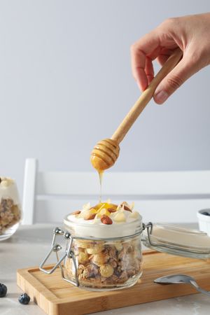 Muesli with yogurt, concept of tasty breakfast