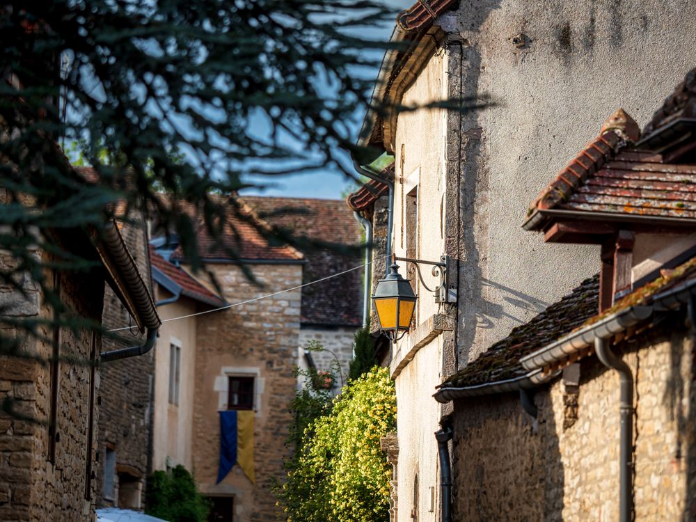 Medieval city of Chateauneuf in Burgundy. A cozy, cute town that grew up around a huge old castle.
