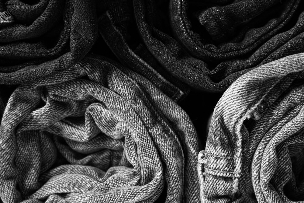 Concept of modern casual clothes - jeans, rolled jeans