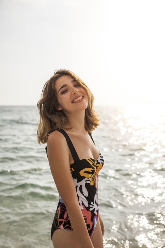 Female in swimsuit in water