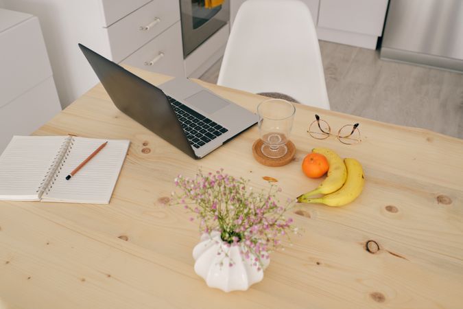 Workplace with laptop in dining room