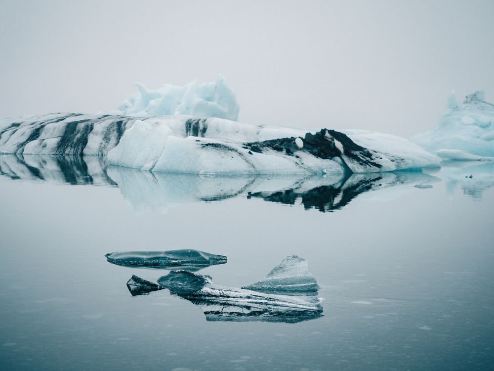 Ice on water between snow