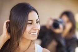 Young Adult Iranian Female Model Poses for Photographer