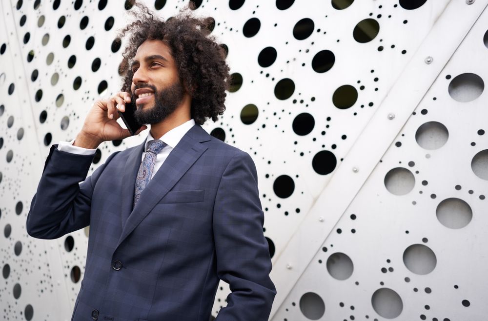 Presentable businessman during phone conversation