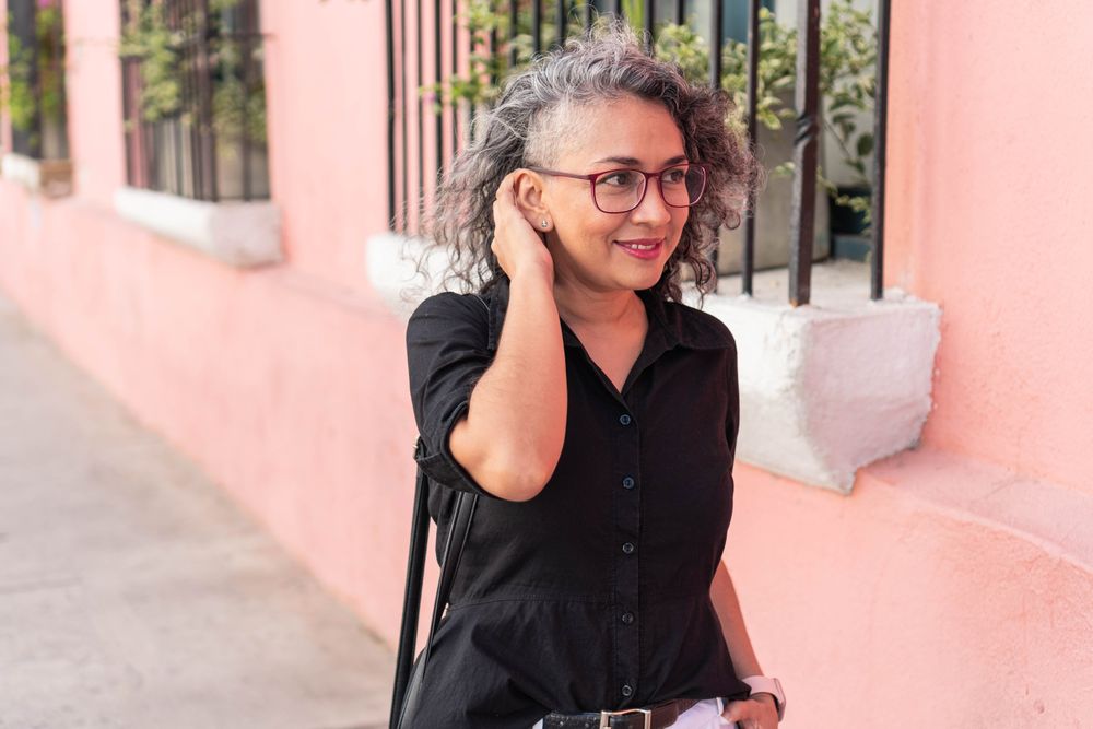 Modern woman walking down the street