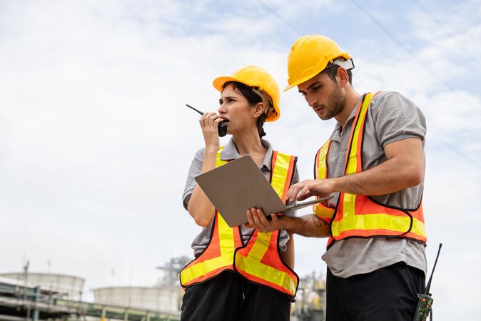 Engineer worker checking project at petrochemical factory or refinery oil plant industrial.