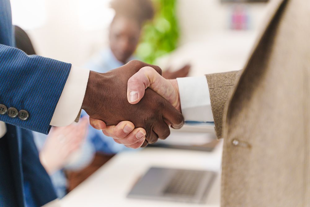Close up of two businessman shaking hands