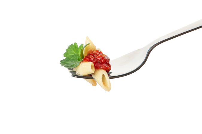 Fork with tasty pasta isolated on blank background