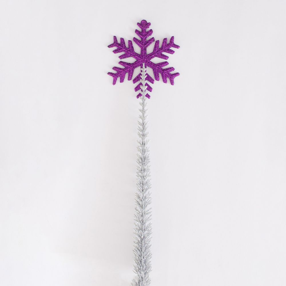 Violet snowflake on a silver frozen branch