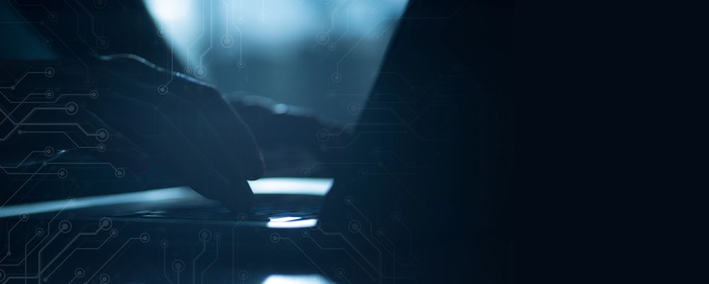 IT Specialist Working In Low Light banner