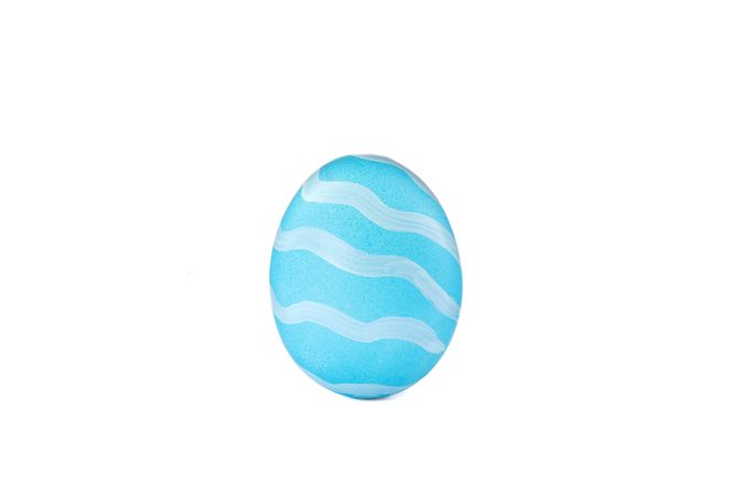 Decorative Easter egg isolated on light background. Festive tradition