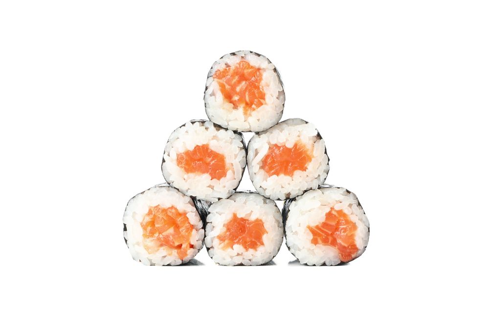 Japanese food. Delicious sushi rolls isolated on light background