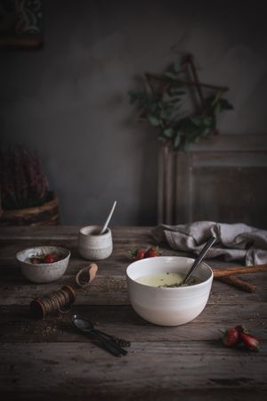 Strawberry porridge in bowl on table