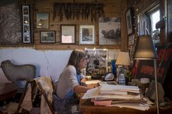 Woman farmer doing office work on her farm