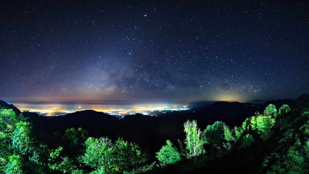 Starry night sky at Monson viewpoint Doi AngKhang and milky way galaxy with stars and space dust in the universe