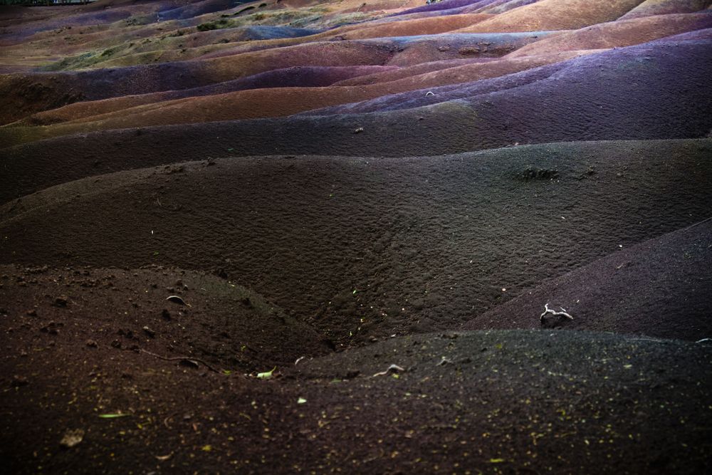 Multi-colored hill in Mauritius under clouds