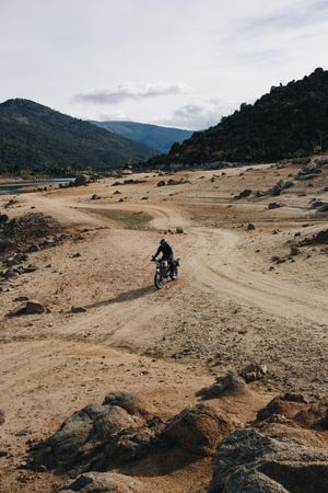 Motorcyclist on off-road adventure track