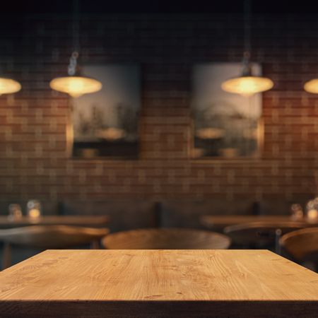 a table in a coffee shop with a blurred background
