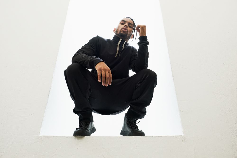 Dancing Black male with braids