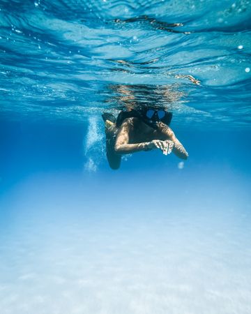 Underwater shot of a person swimming