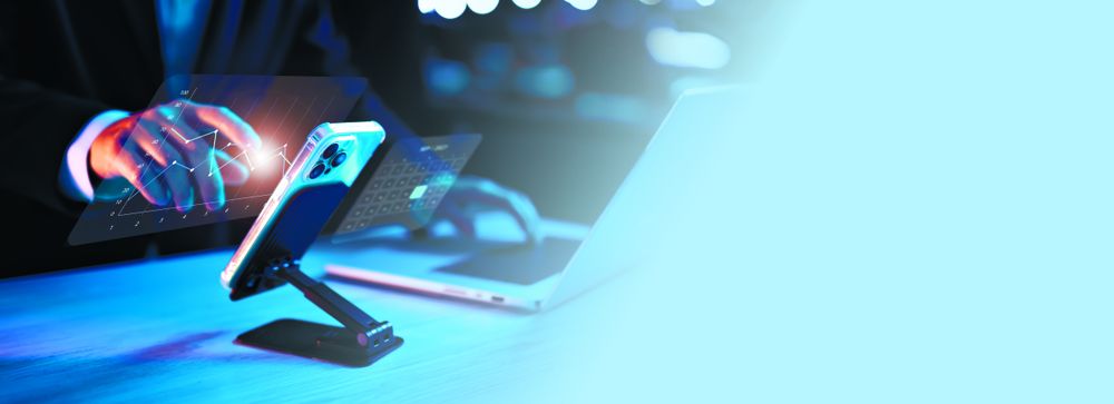 Business strategy using smartphone and laptop banner