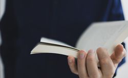 Man Reading Book Close-Up