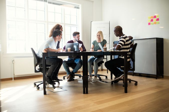 Group of people working together in an office