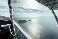 Flight over islands in the middle of the sea