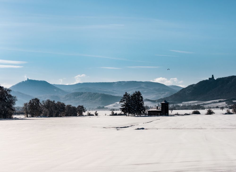 Snow-covered white fields in Alsace, top view.