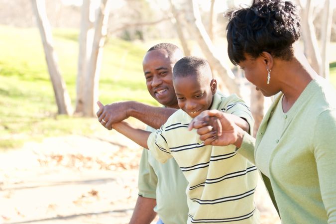 Black Family Playing Outside