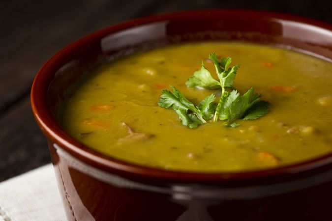 Pea soup. Bowl with pea soup on the table