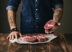 Man holding a steak