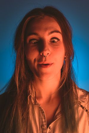 Young woman doing funny faces