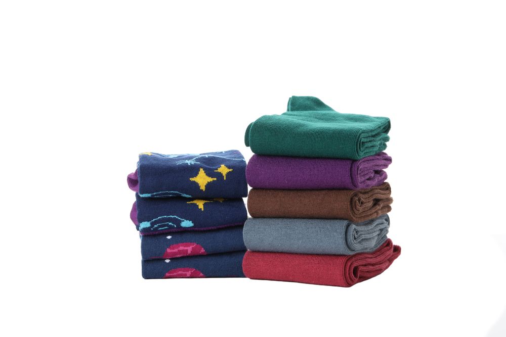 multicolored socks, isolated on light background.