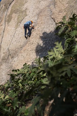 Free climber climbing in nature