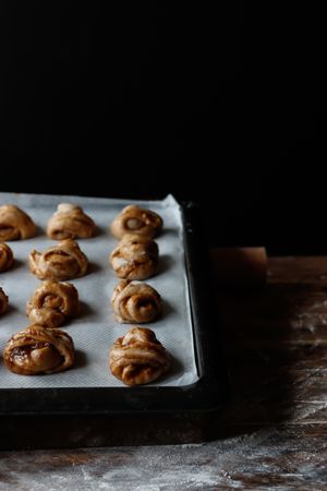 Sugar and cutter near cardamom buns