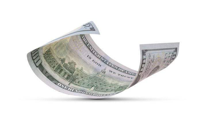 One Hundred Dollar Bill Floating Down To Surface with Drop Shadow
