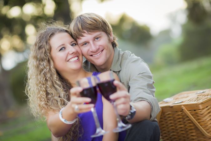 A Couple Enjoying A Glass Of Wine in the Park
