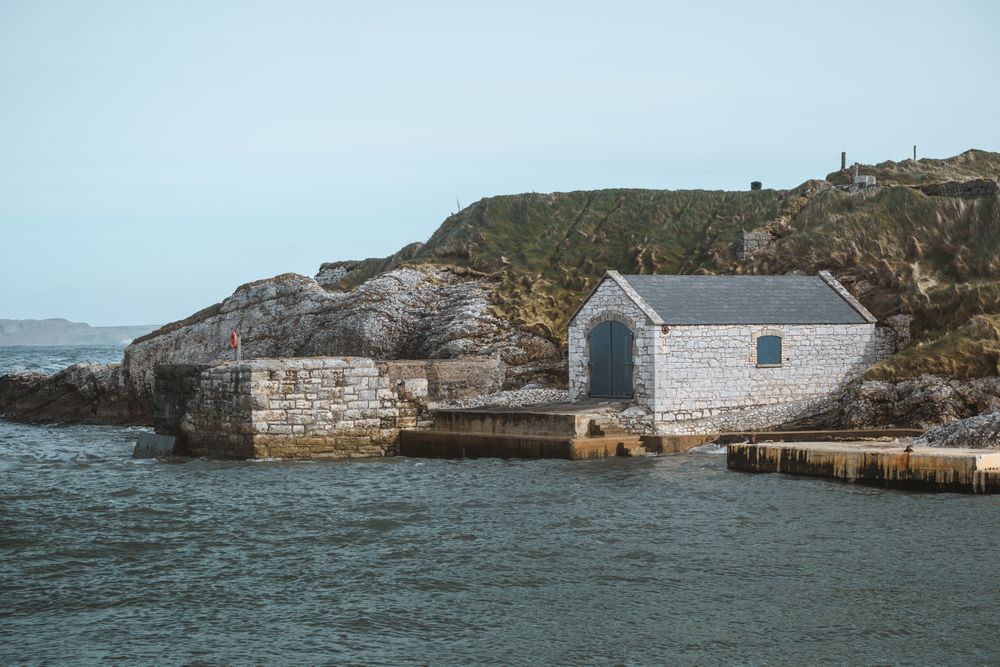 Aged building in quiet harbour