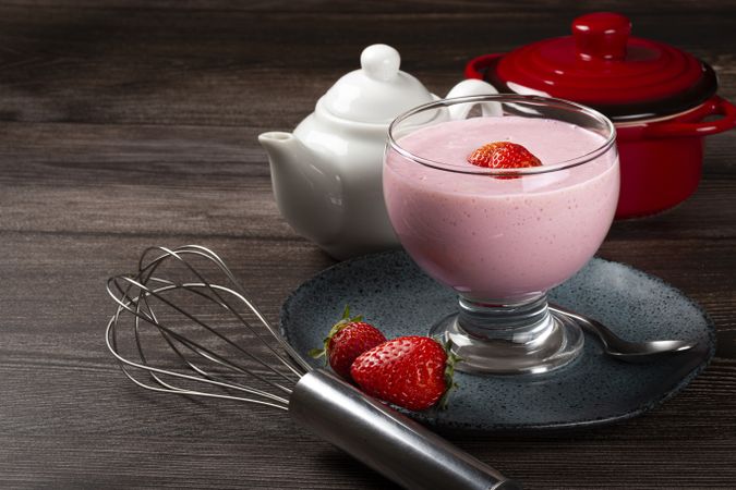 Delicious strawberry mousse in glass goblet.
