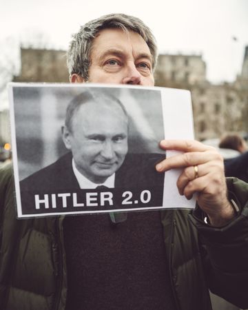 London, England, United Kingdom - March 5 2022: Man with anti-Putin sign in London