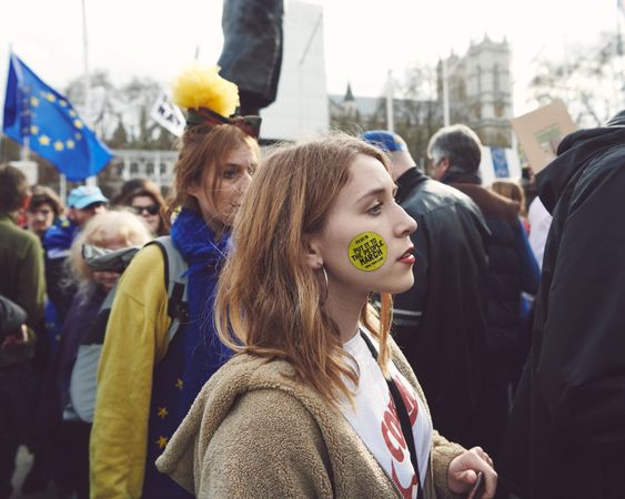 London, England, United Kingdom - March 23rd, 2019: Woman in protest with sticker on face