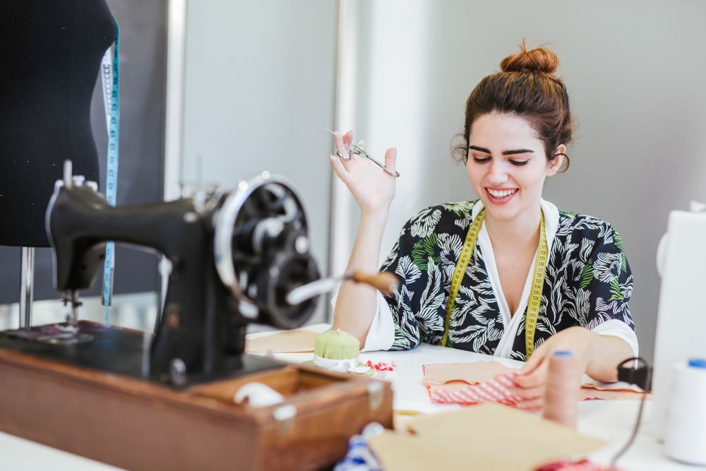 Woman in a sewing school