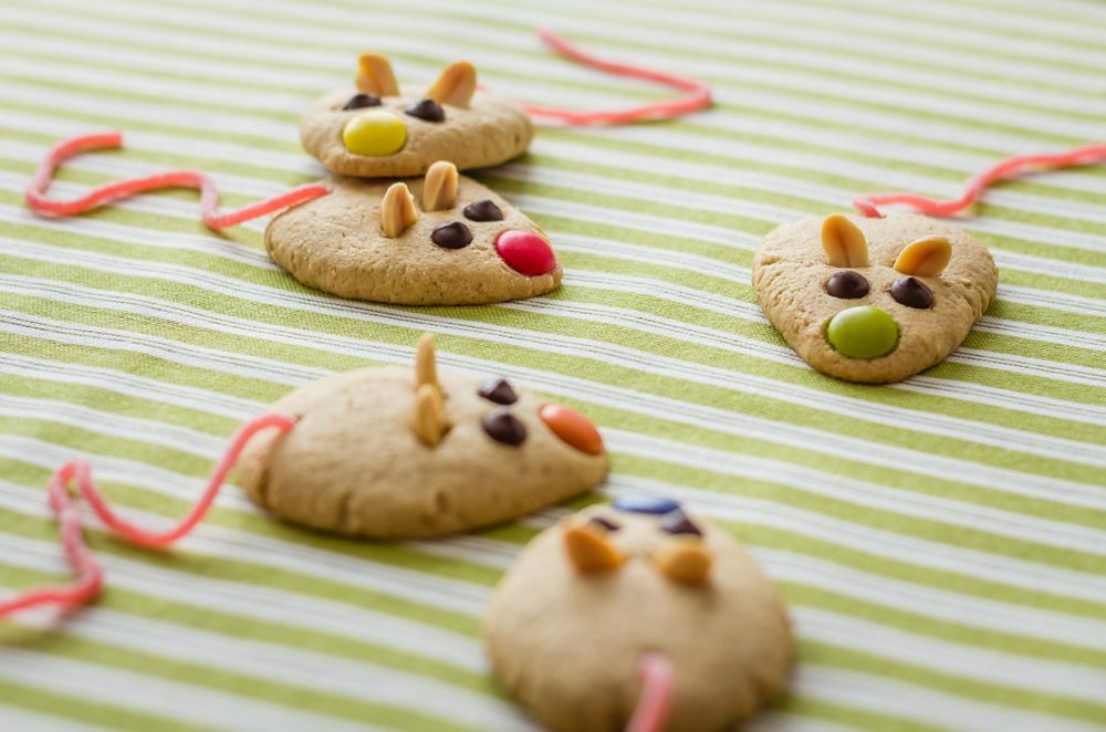 Cookies with mouse shaped and red licorice tail
