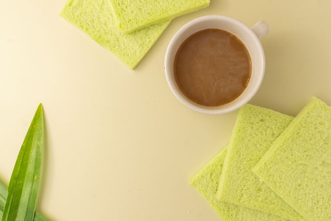Soft pandan flavored bread and milk coffee